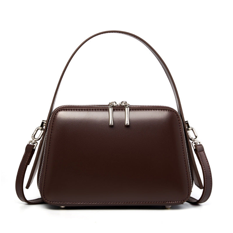 Coffee brown cowhide leather crossbody bag with top handle and silver-tone hardware