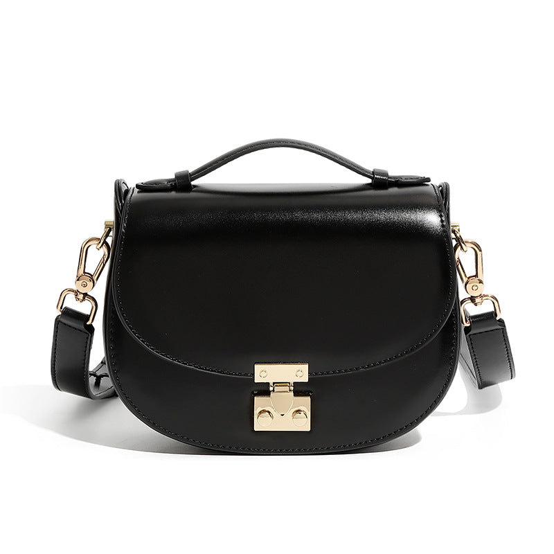 Black cowhide leather mini saddle crossbody bag front view