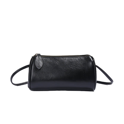 Top-Grain Cowhide Mini Barrel Crossbody Bag in Black