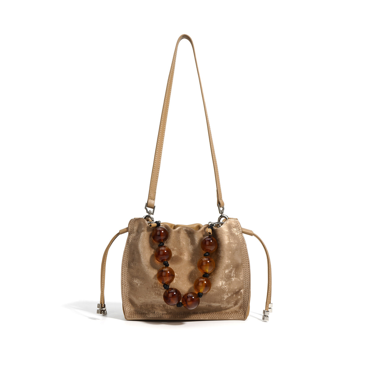 Champagne metallic cowhide mini bucket bag with beaded top handle on white background