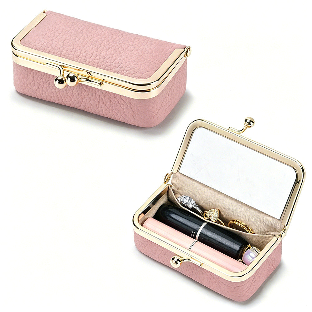 Pink pebbled pouch with mirror and lipstick storage