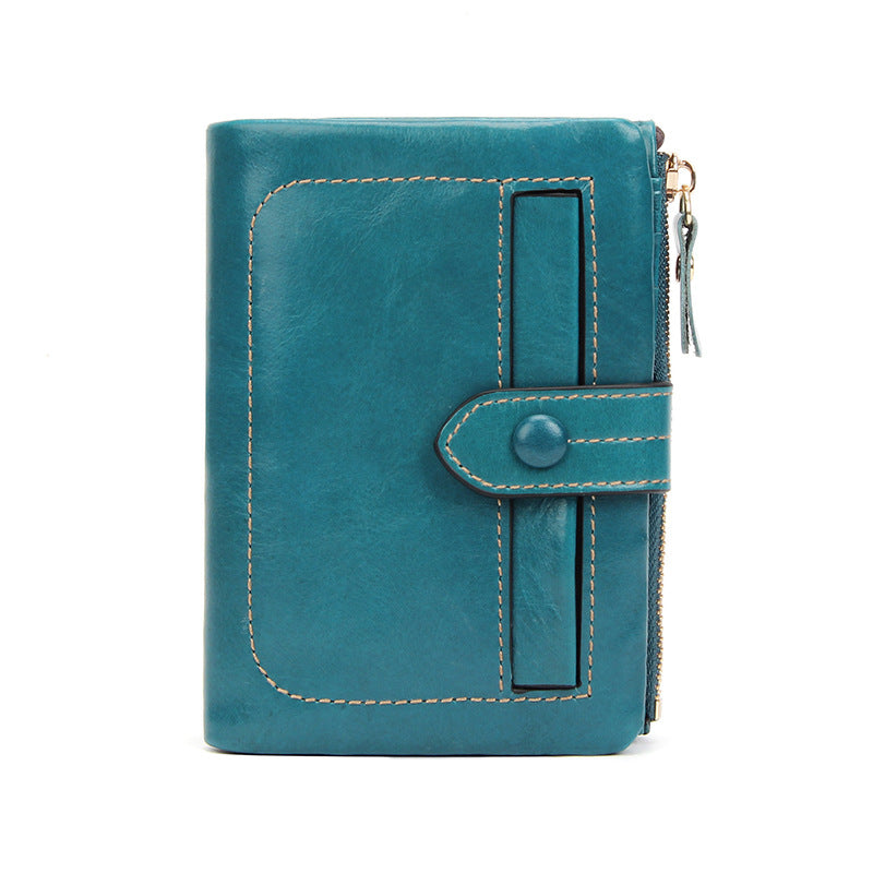 Indigo blue oil-wax cowhide leather wallet with leather strap closure