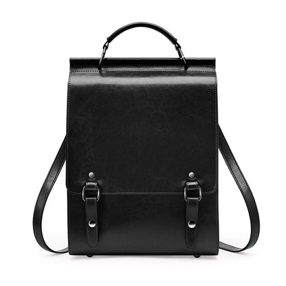 Black cowhide leather backpack with buckle flap front view