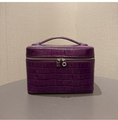 Bottom view of the purple pouches in two sizes