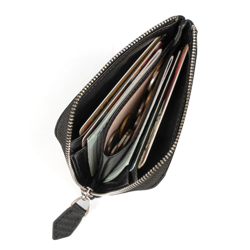 Black leather wallet filled with cards and folded bills demonstrating capacity