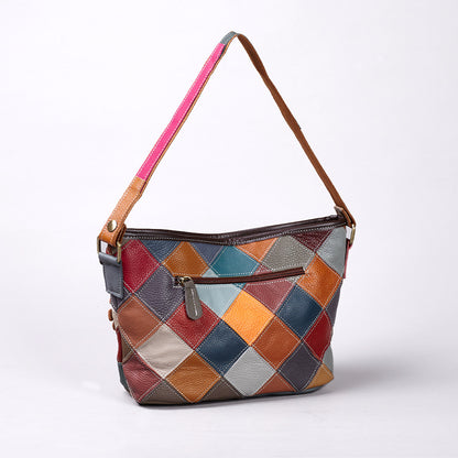Back of the bag with geometric patchwork and exterior zip pocket