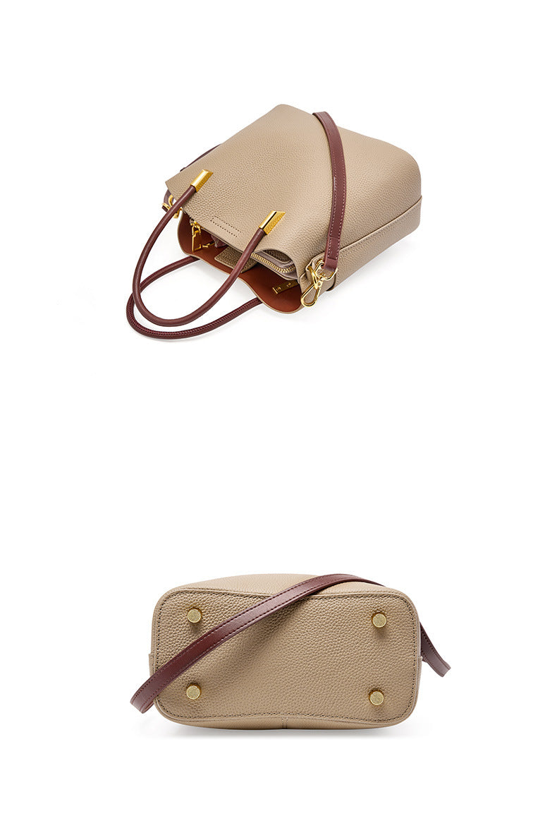 Gray bucket bag shown from the side and bottom angles to display feet and strap