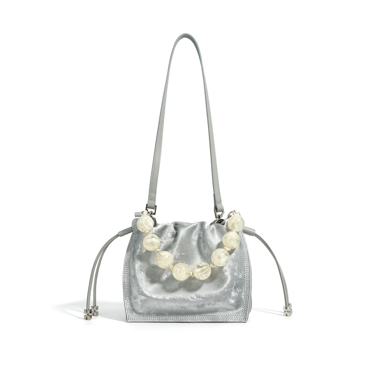 Silver metallic cowhide mini bucket bag with beaded top handle on white background