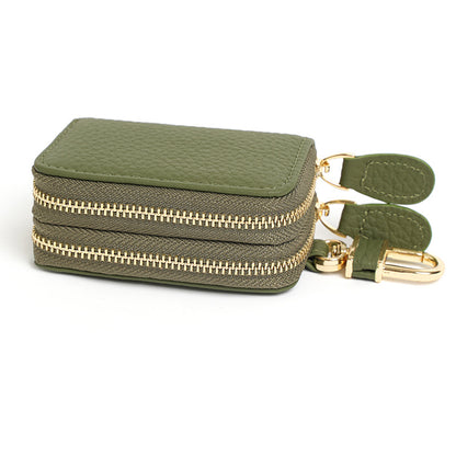 Army green cowhide leather key case pouch with double zipper and gold-tone hardware shown at angle