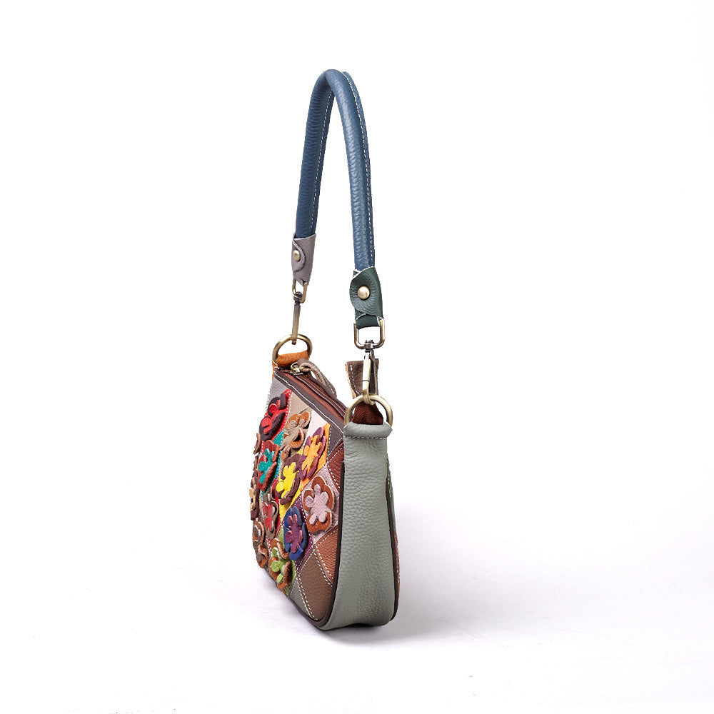 Side profile showing the crossbody bag's depth and strap attachments