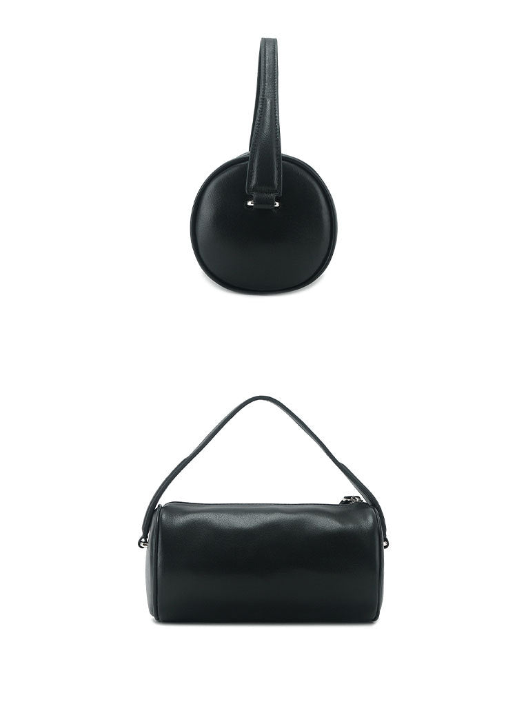 Black cylinder bag shown from the end and front