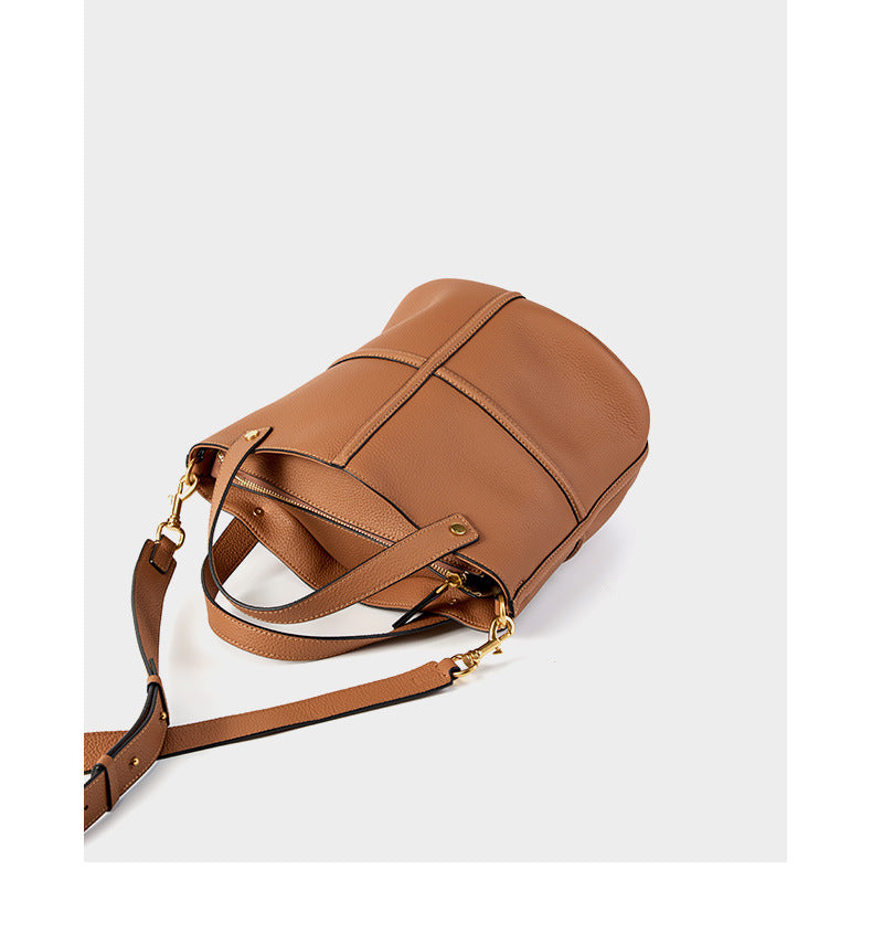 Top-down view of the brown bucket bag showing its interior