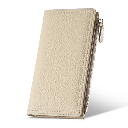 Standing view of the slim beige two-fold wallet and zipper