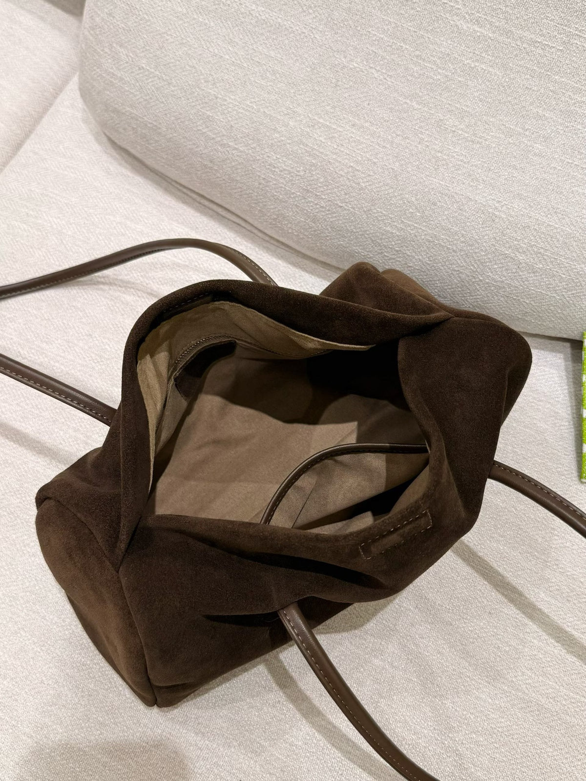 Pair of dark neutral Boston totes shown side by side