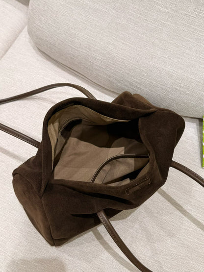Pair of dark neutral Boston totes shown side by side