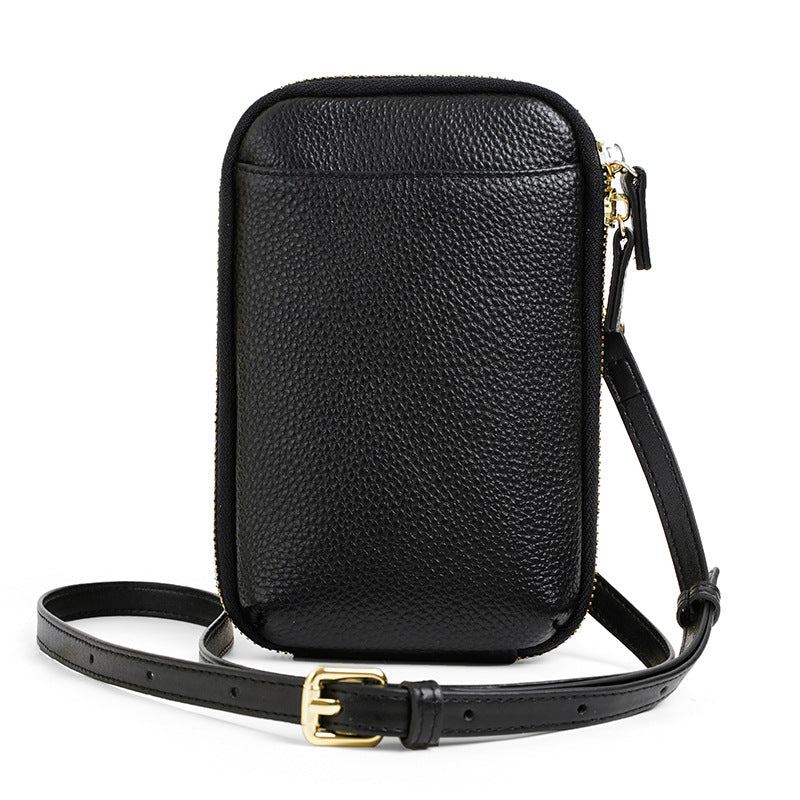 Black pebbled leather vertical phone bag with gold buckle and zip closure