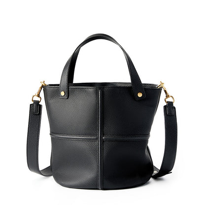 Black top-grain cowhide bucket bag on white background