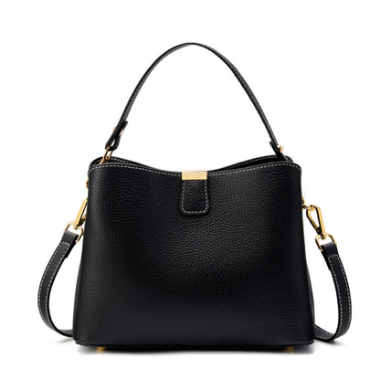 Black pebbled leather bucket bag on white background