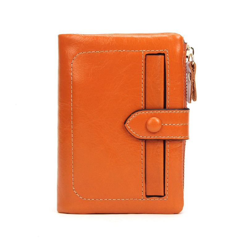 Orange vintage cowhide leather short wallet with snap-tab closure
