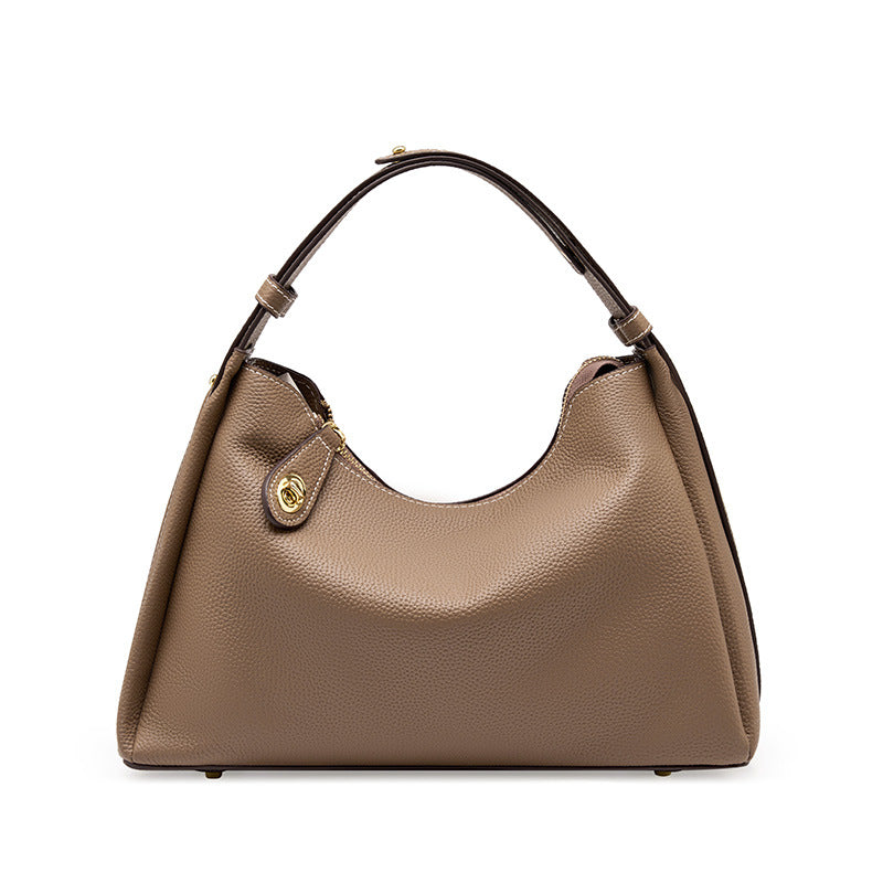 Dark gray cowhide leather shoulder bag front view on white background