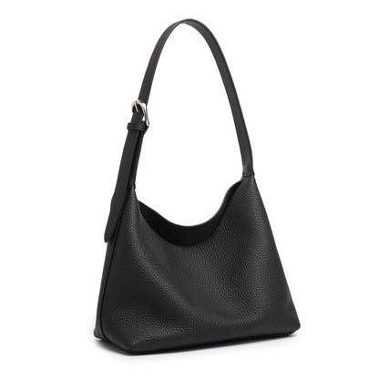 Black pebbled cowhide hobo bag with adjustable shoulder strap on white background