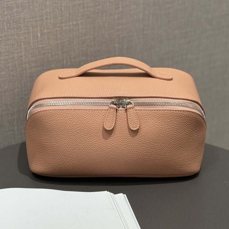 Neutral taupe cosmetic pouch viewed from above