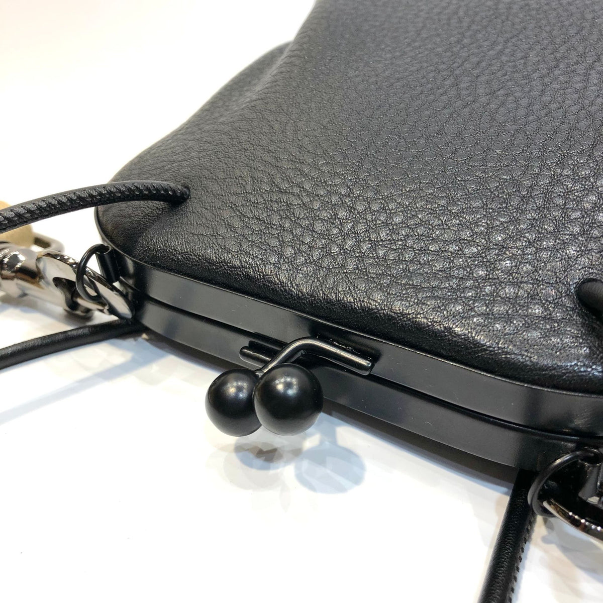 Open bag interior shown with a phone inside