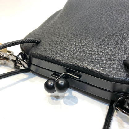Open bag interior shown with a phone inside