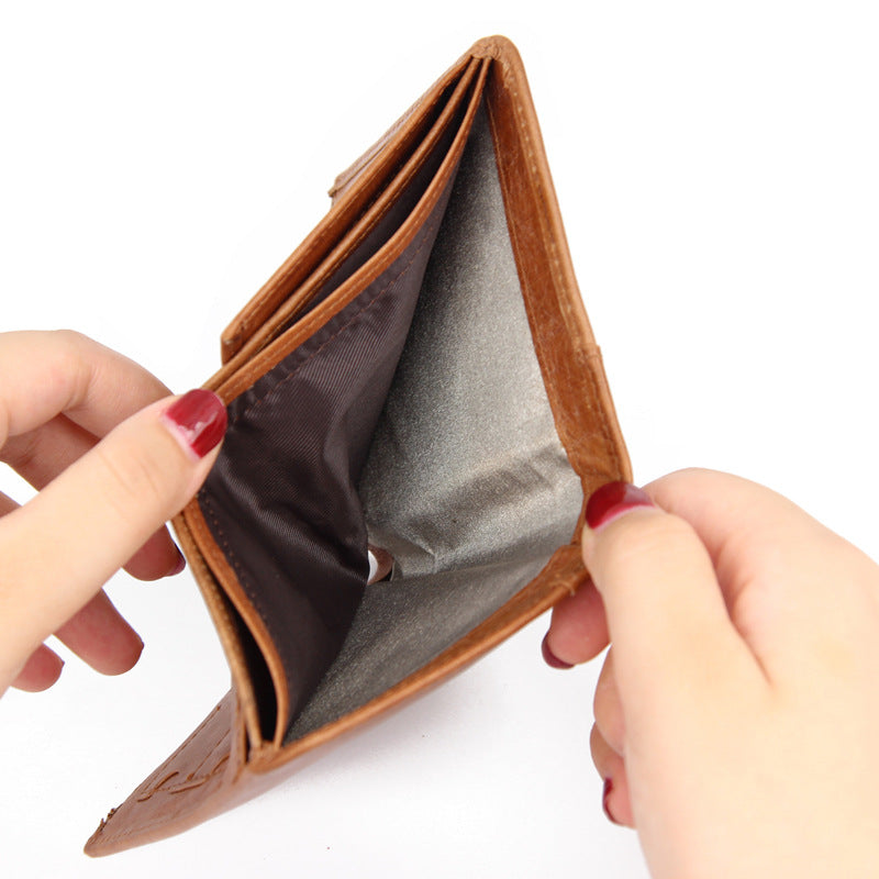 Close-up of polyester interior lining with RFID-shielding material inside the wallet