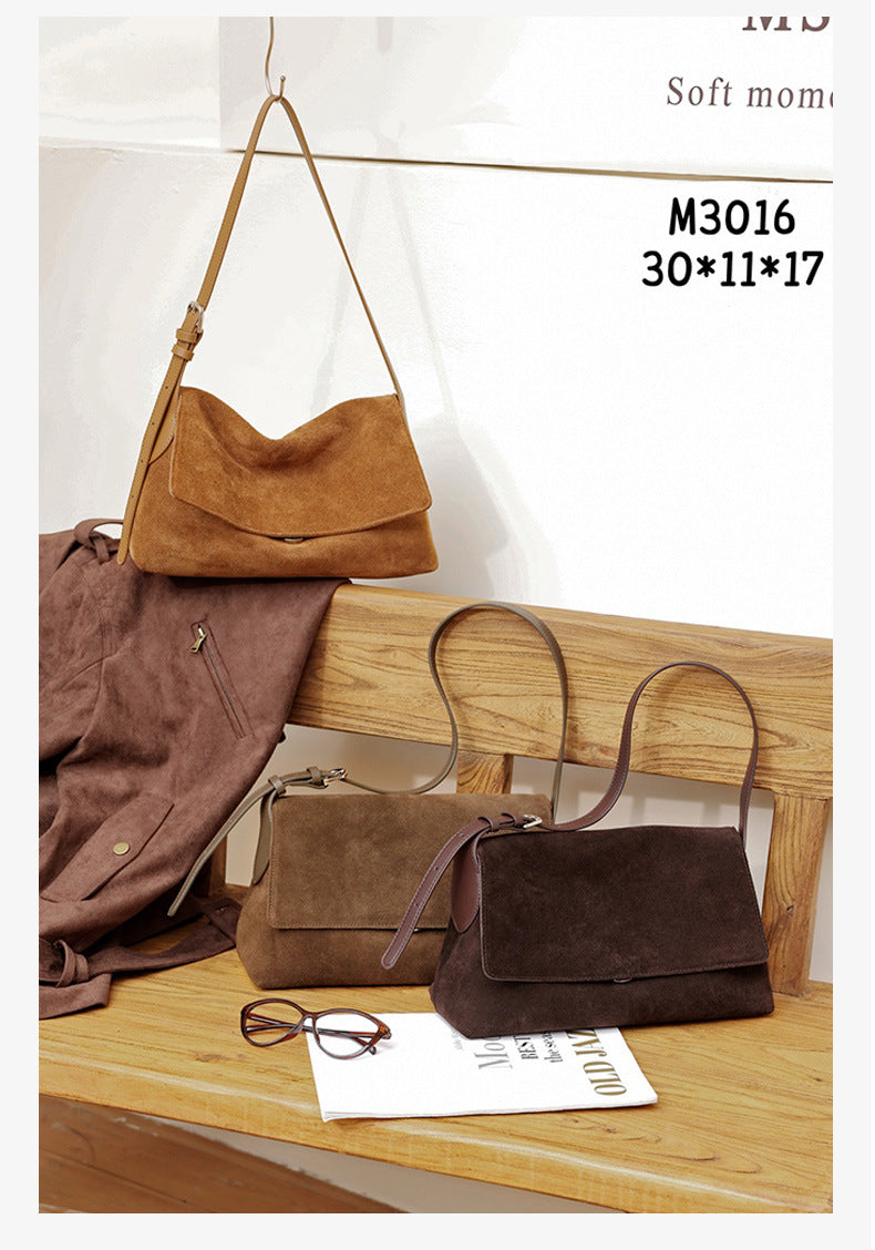 Three color options of the leather shoulder bag with dimensions shown