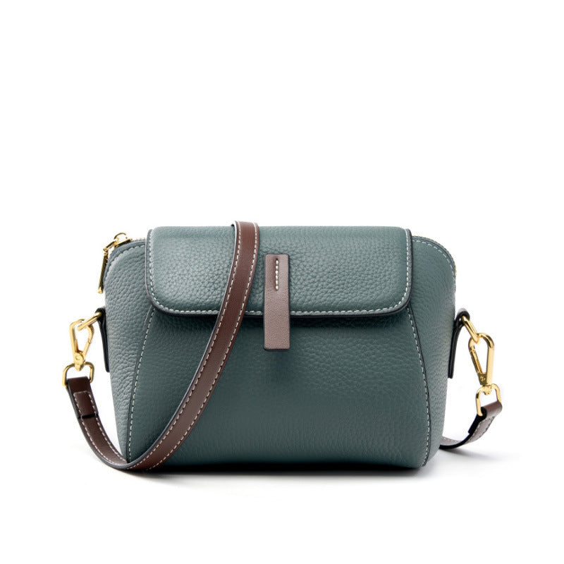 Sea blue top-grain cowhide shell crossbody bag with brown leather pull tab and gold-tone hardware