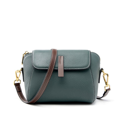 Sea blue top-grain cowhide shell crossbody bag with brown leather pull tab and gold-tone hardware