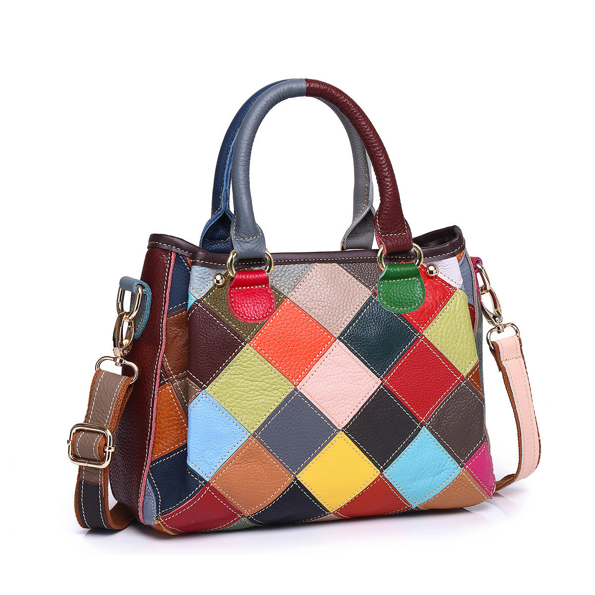 Angled front view showing the quilted color-block shell bag silhouette