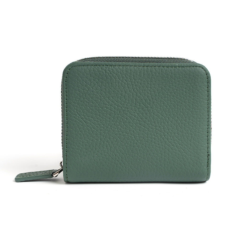 Jade green wallet shown from side angle displaying zipper detail