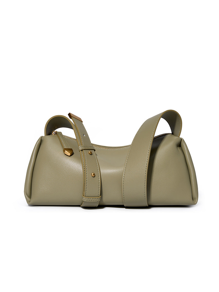 Green cowhide pillow crossbody bag front view on white background