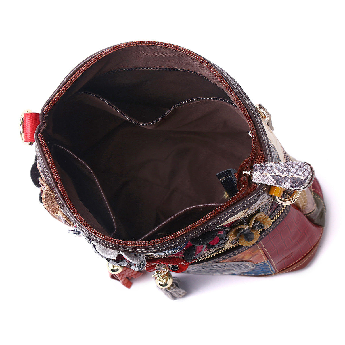 Open crossbody bag showing polyester lining and interior pockets