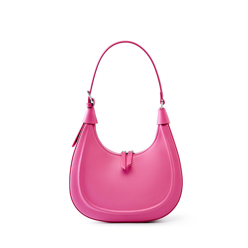 Cherry blossom pink crescent cowhide shoulder bag on white background