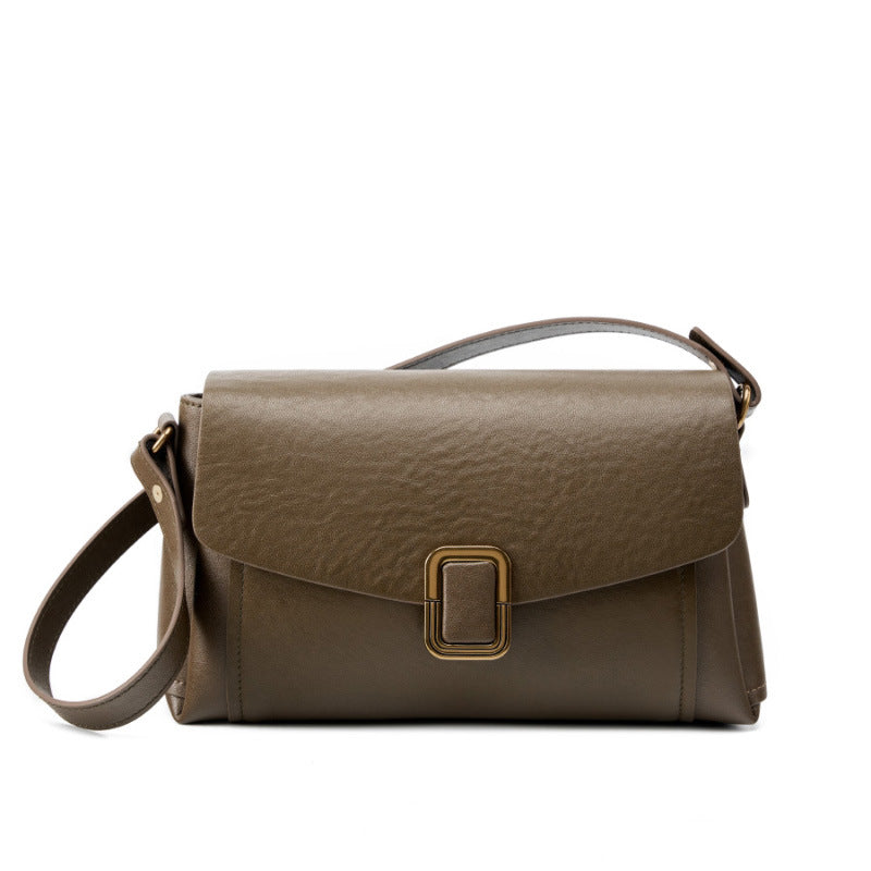 Walnut brown cowhide leather crossbody bag with gold-tone buckle on white background