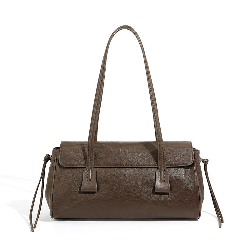 Coffee brown cowhide leather shoulder bag with top handles on white background