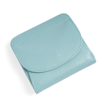 Lake blue leather wallet with snap closure on white background