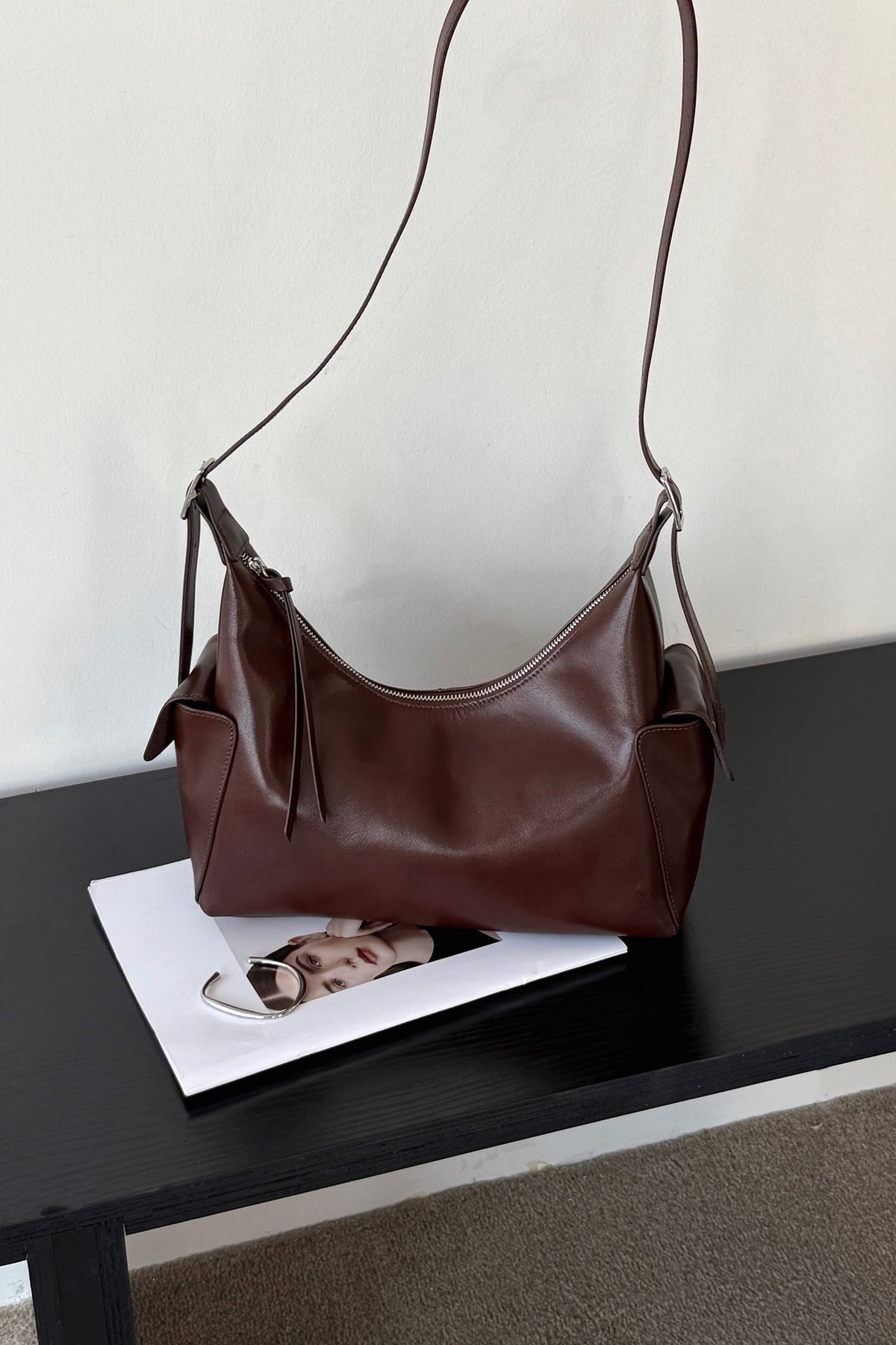 Chocolate brown cowhide hobo bag with single shoulder strap
