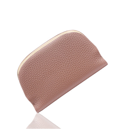 Pink pebbled cowhide coin purse shown closed
