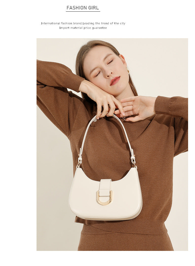 Model with cream white leather shoulder bag and FASHION GIRL graphic