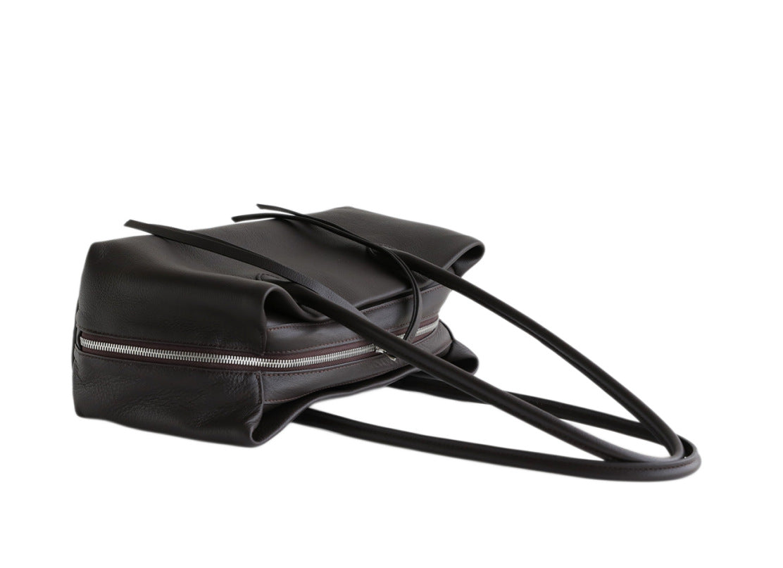 Open black tote showing interior compartments