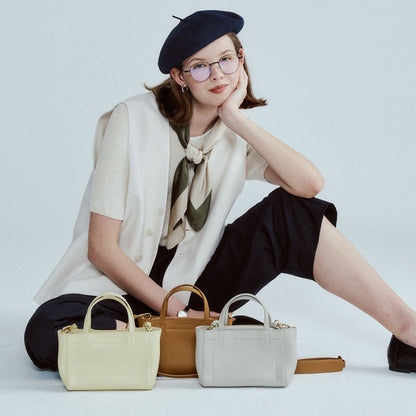 Lifestyle view of the three tote colors together