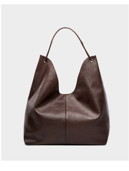 Dark brown hobo tote bag back view on light gray background