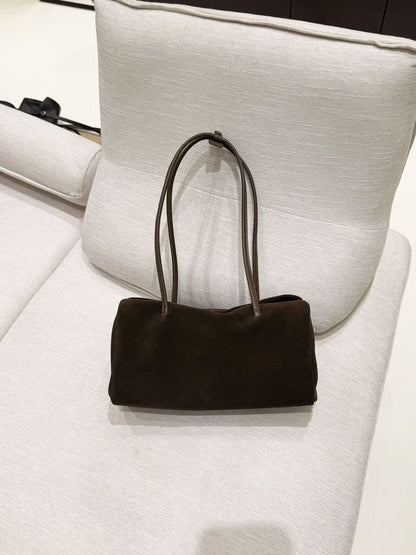 Dark brown Boston shoulder tote displayed against a neutral backdrop