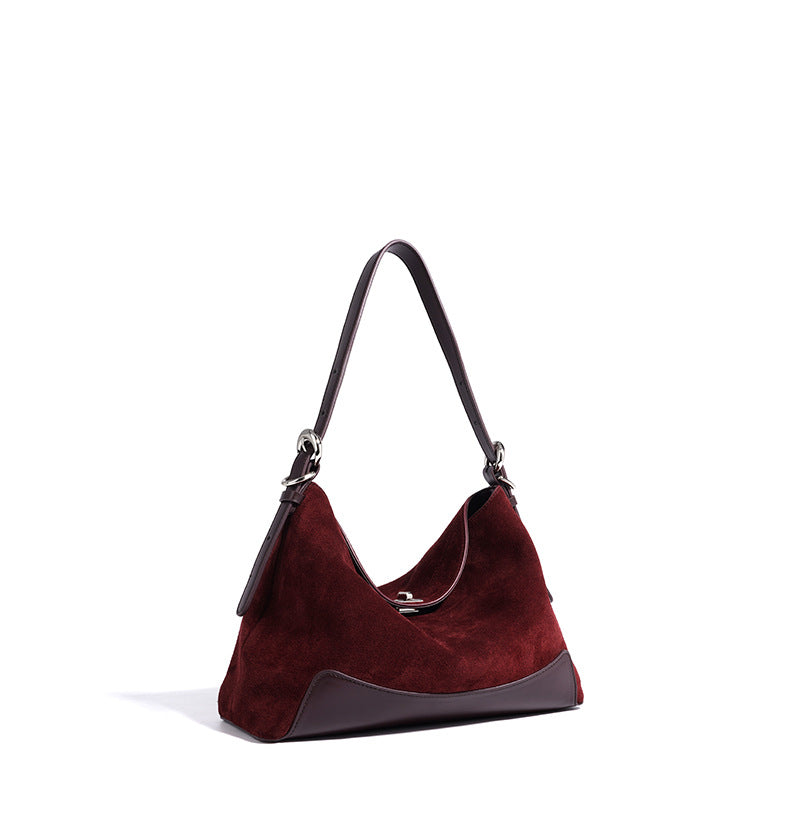 Front view of the burgundy split suede shoulder tote