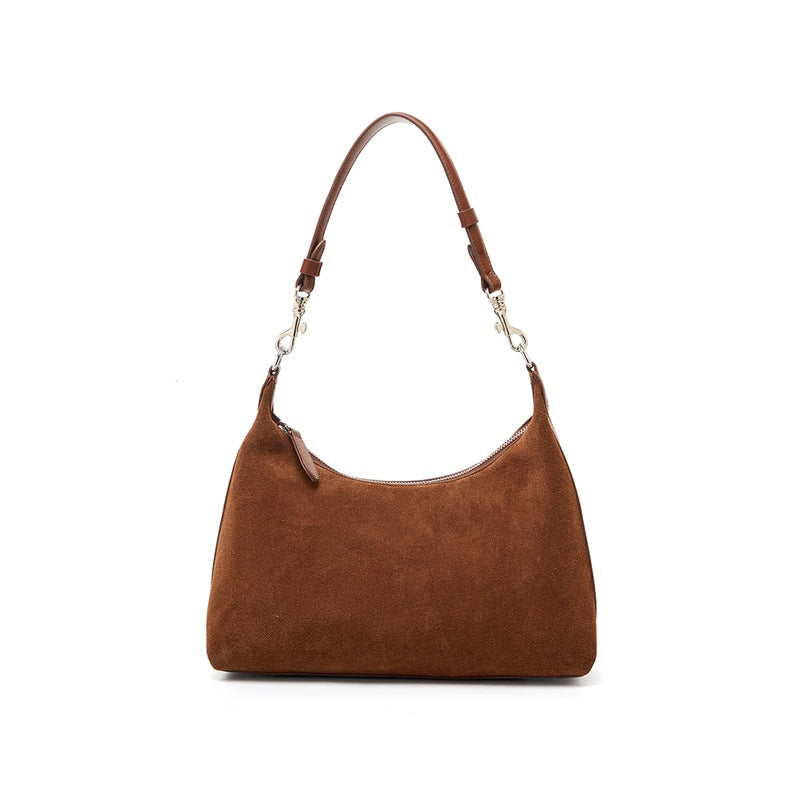 Brown suede-finish cowhide shoulder bag on a white background