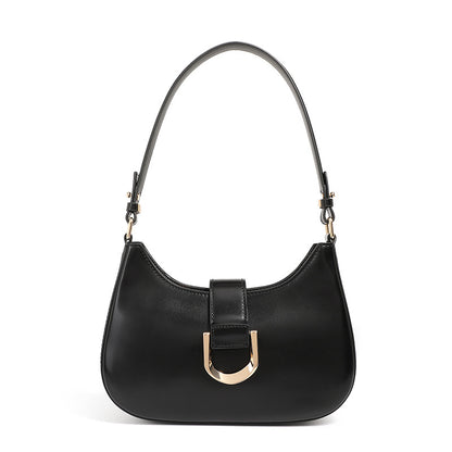 Black cowhide shoulder bag front view on white background